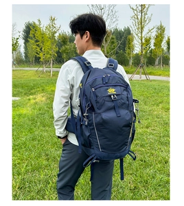 Detail of blue hiking backpack with reinforced straps and heavy-duty side buckles