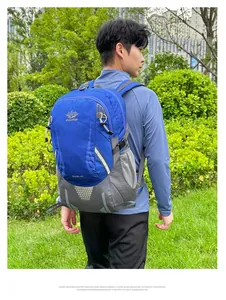 Detail of blue 45L outdoor hiking backpack with side mesh pocket and reflective strips