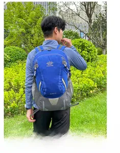 Detail view of the VANAHEIMR 40L outdoor backpack with side mesh pocket and nylon texture