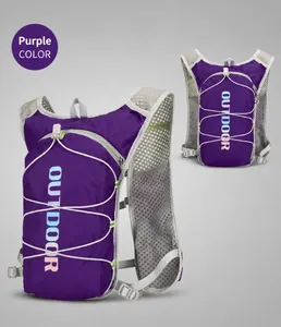 Detail view of purple hydration vest showing breathable mesh and elastic cords for running