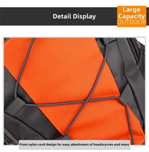 Front elastic rope detail on orange outdoor backpack for fixing towels or gear