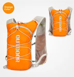 Macro shot of breathable mesh straps and orange fabric on lightweight hydration pack