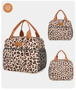 Macro shot of khaki leopard print insulated lunch bag with side mesh pocket and handles