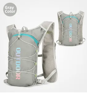 Detail of grey running hydration vest with breathable mesh and blue zipper accents