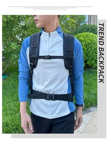 Detail of tactical outdoor backpack with red stitching, adjustable chest straps and D-rings