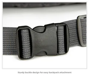 Close-up of durable black plastic waist buckle and nylon webbing on outdoor backpack