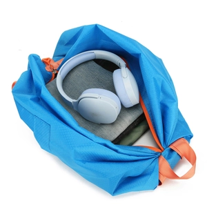 Blue foldable sports backpack with honeycomb texture showing large storage capacity