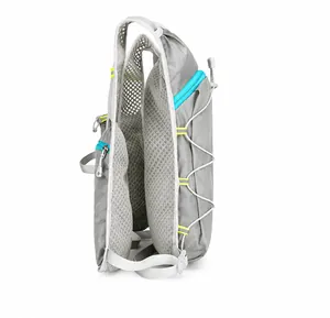 Detailed side view of hydration vest with breathable mesh and teal zippered pockets