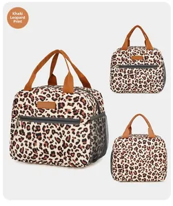 Detail view of khaki leopard lunch bag with reinforced handles and side mesh pocket