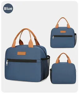 Blue insulated lunch bag with reinforced brown handles and practical side mesh pocket