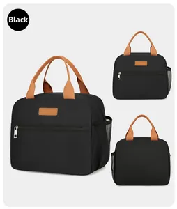 Detailed view of black Oxford cloth thermal lunch bag with side mesh pocket and handle