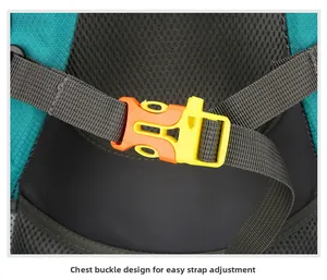 Detail of chest buckle on a blue hiking backpack with honeycomb textured fabric