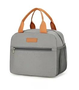 Gray oxford fabric insulated lunch bag with orange-brown handles and side mesh pocket