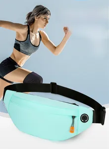 Detail view of mint green waterproof sports waist bag with earphone port and zipper