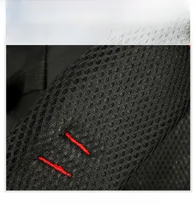 Detail of breathable honeycomb mesh shoulder straps with reinforced red stitching for hiking packs