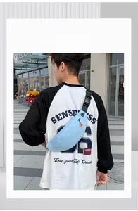 Detail showing the light blue waterproof running waist bag with adjustable black strap