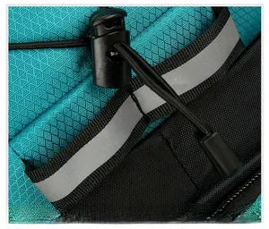 Detail of tear-resistant nylon hiking pack with grey reflective safety strip and drawstring