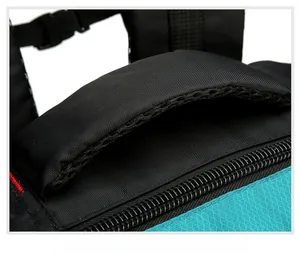 Detail of reinforced honeycomb mesh handle on durable outdoor nylon hiking backpack