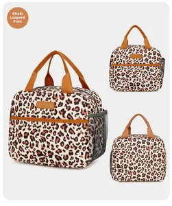 Detailed view of leopard print insulated lunch bag with mesh pocket and sturdy handles