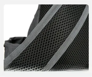 Close-up of thick breathable honeycomb mesh shoulder strap on black outdoor crossbody bag