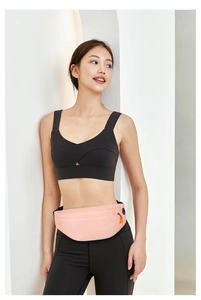 Detail view of the waterproof running waist bag with a functional headphone jack feature