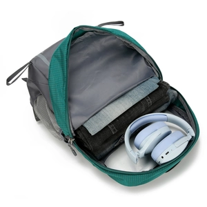 Large capacity outdoor travel backpack in green and grey, shown open with internal storage.