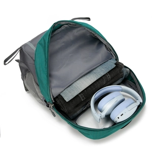 Outdoor hiking backpack in teal and gray showing large storage capacity from top view