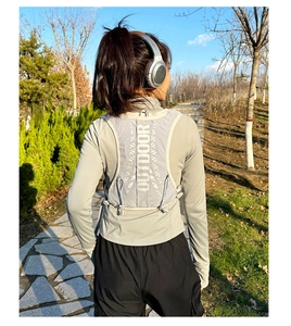 Detailed back view of a grey 5L hydration vest with reflective Outdoor text for running