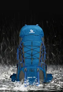 Waterproof testing of 60L hiking backpack with rain splash effect on blue nylon fabric