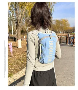 Outdoor trail running vest in blue nylon with white print and elastic cords system