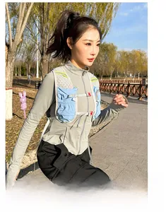 Detail of grey running jacket and blue reflective hydration vest with mesh pockets
