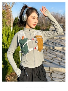 Detail of breathable running vest with mesh material and multi-pocket design for hiking