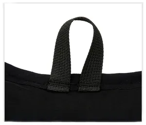 Detail of the high-density nylon top handle strap with reinforced cross-stitching on the bag