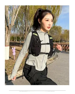 Detail of running vest featuring safety reflective strips and adjustable chest straps on nylon