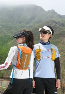Detail of lightweight hydration vest showing multi-pocket mesh and color-block design