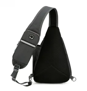 Detail of oxford chest bag breathable mesh back with headphone hole and reflective strip