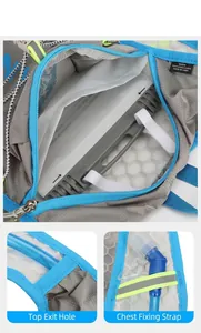 Detail of hydration vest showing water bladder compartment and shoulder hose outlet