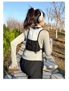 Outdoor running vest with reflective lettering on model running through forest trail