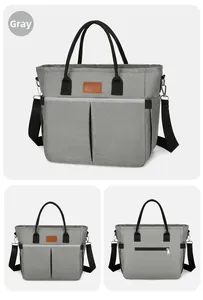Display a tre viste di una borsa termica grigia con tasche anteriori e vano posteriore