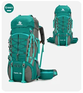 Detail of 60L peacock green hiking backpack showing front bungee cord and durable nylon