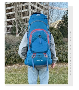 80L blue hiking backpack with orange zippers and adjustable straps for outdoor camping
