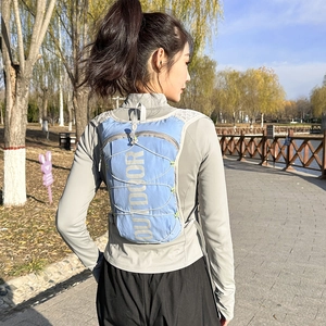 Lightweight sky blue hydration vest backpack with OUTDOOR print for running and marathon