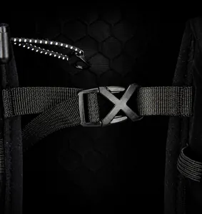 Macro detail of the durable plastic buckle and nylon webbing on the breathable mesh backpack