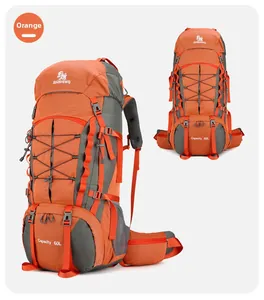 Detailed view of 60L orange hiking backpack with external mounting system and durable nylon