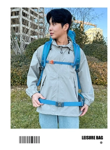 Detail of blue 80L hiking backpack showing chest straps and lumbar support system