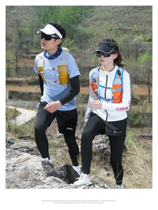 Detail of professional hydration vest with reflective strips and multi-pocket system