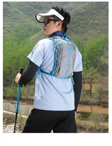 Outdoor hydration backpack with elastic z-cords for cycling and hiking on a model