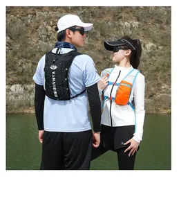 Outdoor hydration vests for running and hiking shown on male and female models