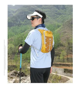 Close-up of lightweight yellow and brown hiking backpack with elastic cord system