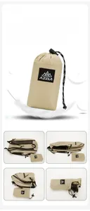Detail view showing folding process of a lightweight beige waterproof outdoor backpack